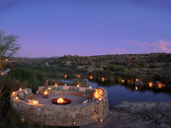 South Africa - Bushmans Kloof Wilderness Reserve. A century-old homestead turned nature reserve cares for 20,000 acres of habitat that includes archeological sites that include 10,000 year old San rock paintings. Images from library at http://media.redcarnationhotels.com/.